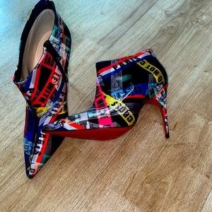 Christian Louboutin red bottom heels. Never worn before.